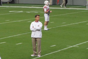 Coach Jones Observing warm-ups.