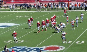The Jaguar offense looks to the sideline for play adjustments against UTSA.